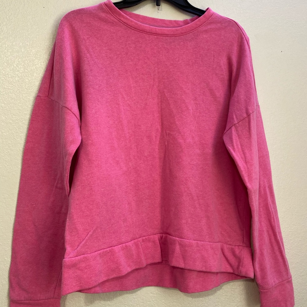 Soft, pink sweatshirt.